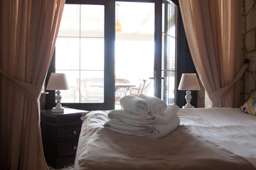 Fototapeta na wymiar interior of a luxury double bed hotel bedroom