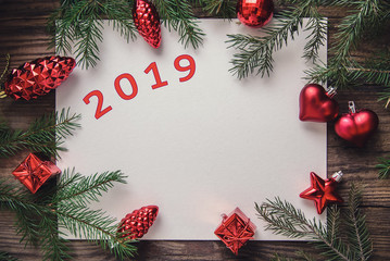 Fototapeta na wymiar Beautiful new year card with number 2019 on wooden background