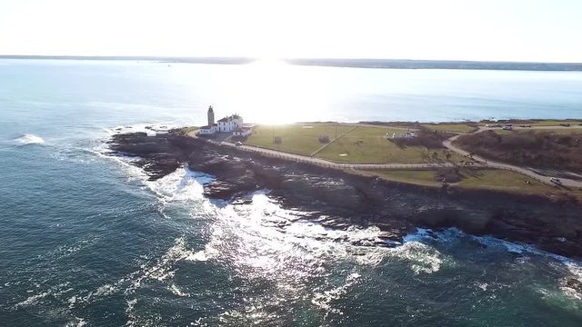Rotating aerial shot of Jamestown Rhode Island with a rocky peninsula