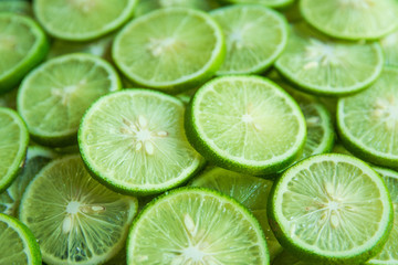 Citrus fruit of lime slices background