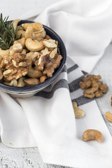 Assortment of nuts. On a light background.