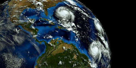 Extremely detailed and realistic high resolution 3D illustration of 3 hurricanes approaching the USA. Shot from Space. Elements of this image are furnished by Nasa.