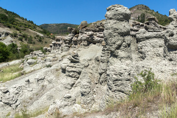 Fototapeta na wymiar Landscape with rock formation The Stone Dolls of Kuklica near town of Kratovo, Republic of Macedonia