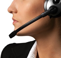 Portrait of a Female Phone Operator in Headset, Side View