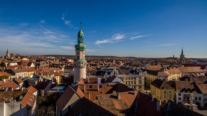 Fototapeta na wymiar Aerial view of medieval sopron with fire tower and blue sky in Hungary