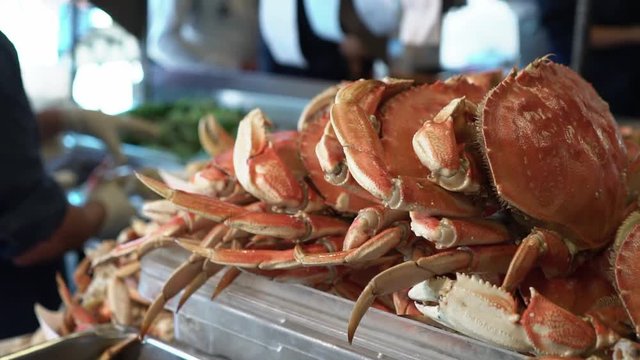 San Francisco Fishermans Wharf. Dungeness crab being cooked and prepared for sidewalk service. 120fps Slow motion.