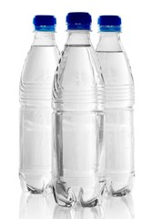 Plastic bottles of water isolated on white
