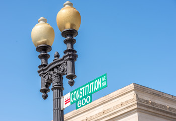 Fototapeta na wymiar Constitution avenue street sign in Washington DC