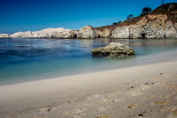 Point Lobos State Reserve sandy beach featuring rocks and caves on them
