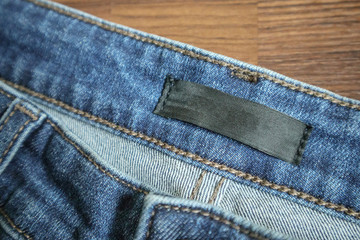 Blue jeans with blank clothing label tag