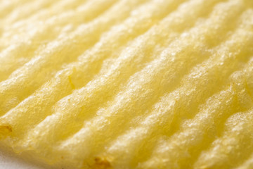Potato chip texture background closeup
