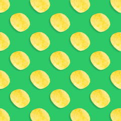 Potato chips pattern on pastel green background top view flat lay