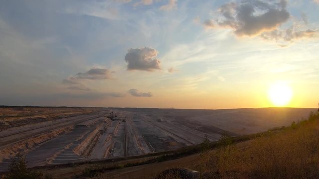 Timelapse of sunset at an open pit mine