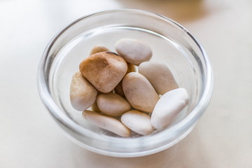 A bowl with stones 