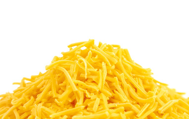 Pile of Grated Cheddar Cheese on a White Background