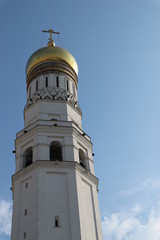 Fototapeta na wymiar Closeup view to the head of Ivan the Great belltower and cathedral, Kremlin, Moscow, Russia