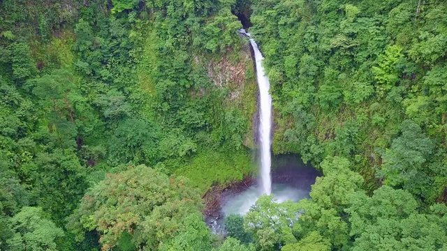 La Fortuna Waterfall in Arenal Volcano National Park, Costa Rica, AERIAL PUSH