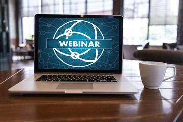 WEBINAR hand on table use E-business Browsing Connection in computer, coffee, Split tone