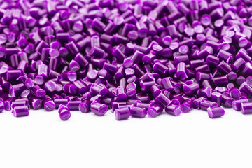 violet plastic resin ( Masterbatch ) on white background