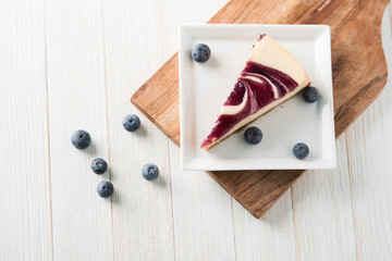 blueberry swirl cheesecake slice 