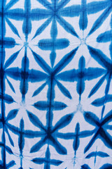 Tie batik dyeing tie batik indigo color or mauhom color on fabric background