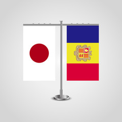 Table stand with flags of Japan and Andorra.Two flag. Flag pole. Symbolizing the cooperation between the two countries. Table flags