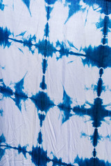Tie batik dyeing tie batik indigo color or mauhom color on fabric background