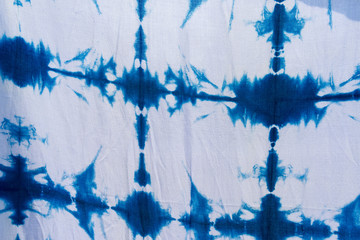 Tie batik dyeing tie batik indigo color or mauhom color on fabric background