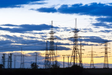 Electricity - Power energy Industry - Electric poles at the sunset with coloful sky