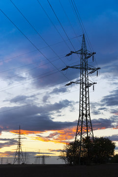 Electricity - Power energy Industry - Electric poles at the sunset with coloful sky