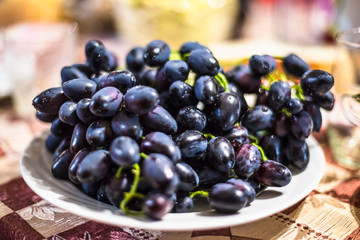 Black grape on a plate