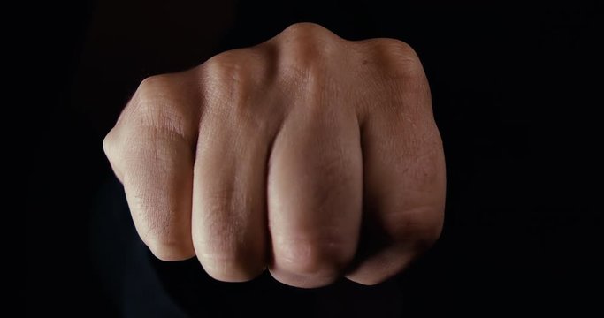 Fist Appearing in an aggressive manor close to camera