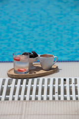 Fototapeta na wymiar a cup of turkish coffee near the pool