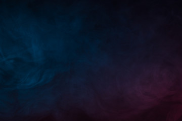 Colorful smoke close-up on a black background