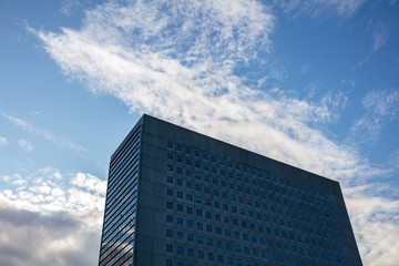 Fototapeta na wymiar Rotterdam, building against blue sky, background.