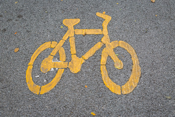 Bike lanes and yellow bike symbol, Bike alley in public park