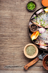 Obraz na płótnie Canvas Fresh raw fish and food ingredients