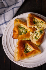 Broken pie with egg and onions
