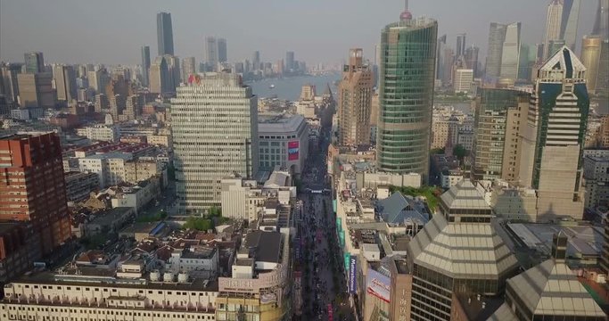 SHANGHAI, CHINA - CIRCA FEBRUARY, 2018: crowds of people walking shopping street
