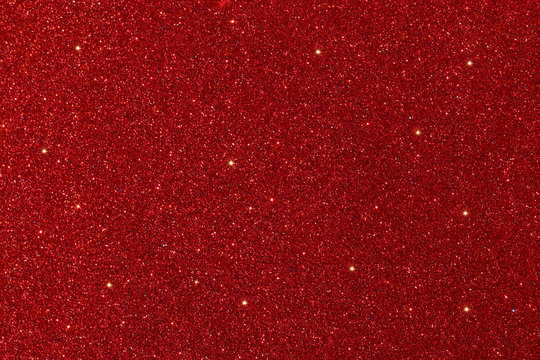 Red glitter lights background. defocused.