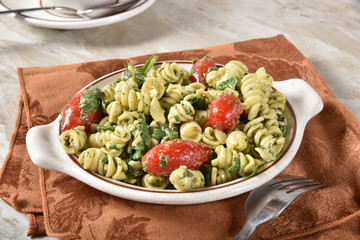Healthy spinach pasta pesto salad