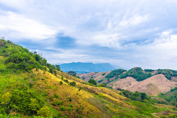 Beautiful  landscape view of hill and  mountain with cloud sky.