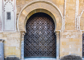 Fototapeta na wymiar Islamic Gate in Cordoba mosque, Spain. An UNESCO WOrld heritage site.