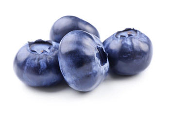 Ripe blueberries on white background