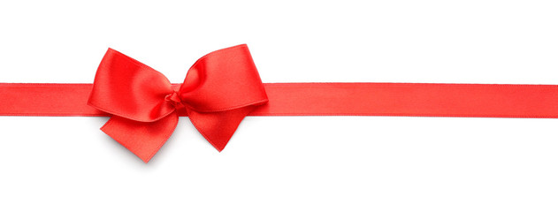 Red ribbon with bow on white background