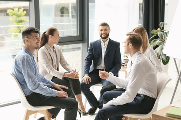 Meeting of business team working in office