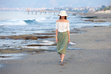 Lonley attractive woman at the beach