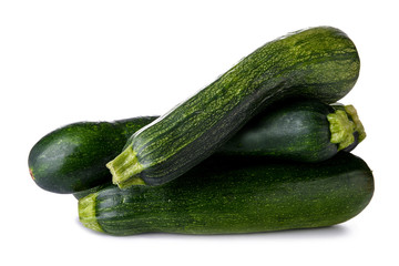 Fresh zucchinis on white background
