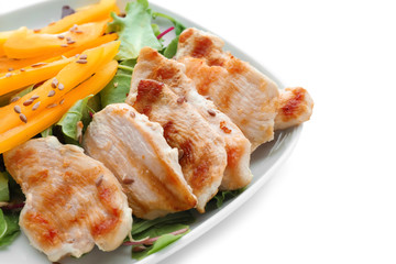 Plate with delicious chicken salad on white background