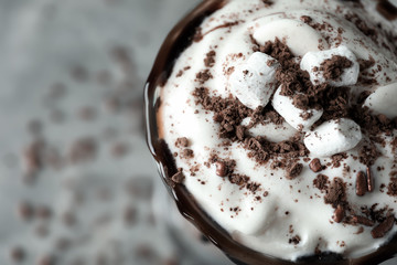 Cup of delicious cocoa with marshmallows, closeup